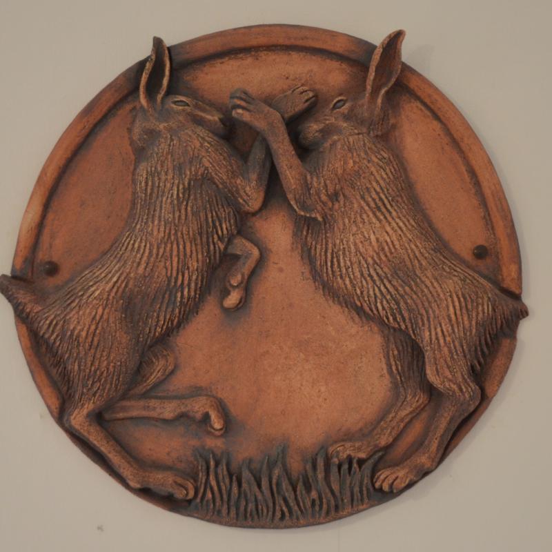 a pair of boxing hares